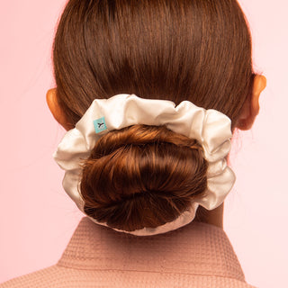 Luxurious Large Silk Scrunchie from Brightly Labs® - Clinically proven Mulberry Silk with silver ion infusion for gentle hold, reduced breakage, and crease prevention. Ideal for stylish updos or ponytails