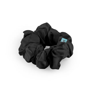 Luxurious Large Silk Scrunchie from Brightly Labs® - Clinically proven Mulberry Silk with silver ion infusion for gentle hold, reduced breakage, and crease prevention. Ideal for stylish updos or ponytails